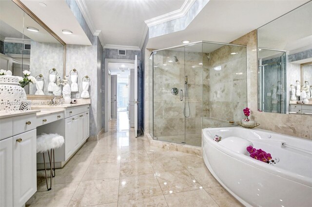 bathroom with ornamental molding, a shower stall, a bath, and vanity