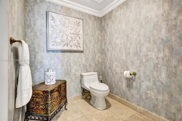 bathroom featuring crown molding, tile patterned flooring, and toilet