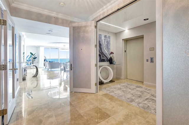 bathroom with ornamental molding, elevator, and a wall of windows