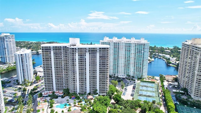 birds eye view of property featuring a water view