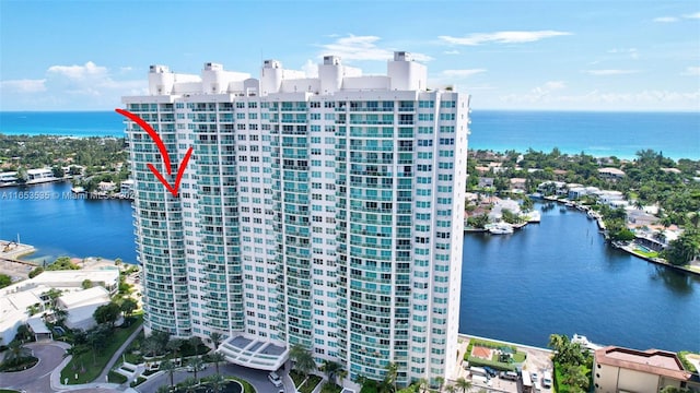 drone / aerial view with a water view