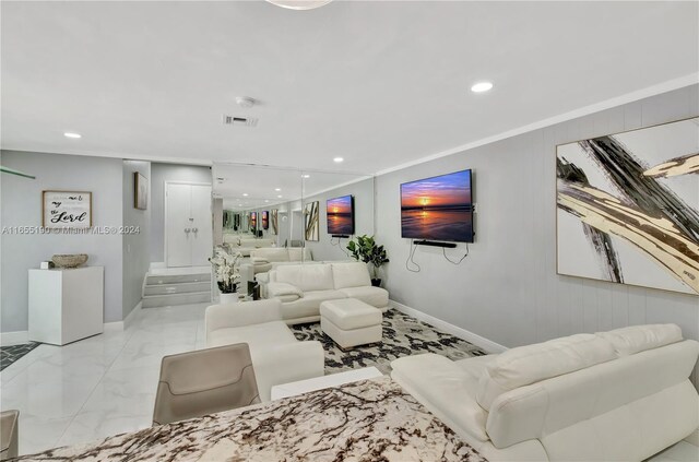 living room featuring ornamental molding