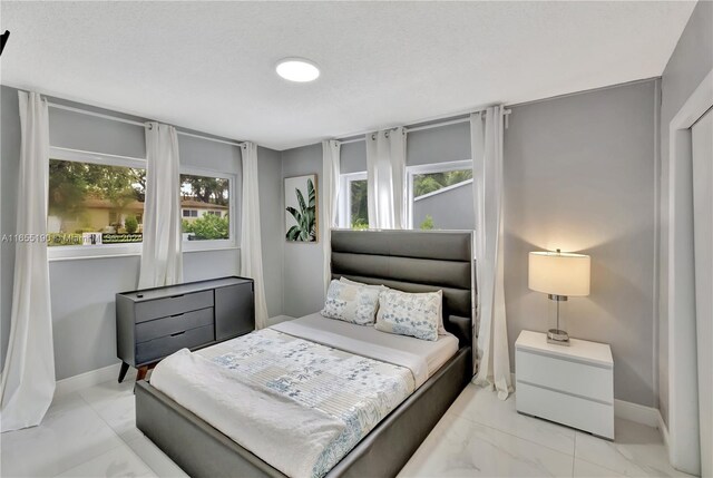 bedroom with a textured ceiling