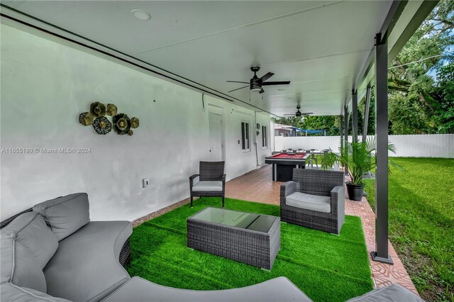 view of patio featuring ceiling fan and an outdoor hangout area