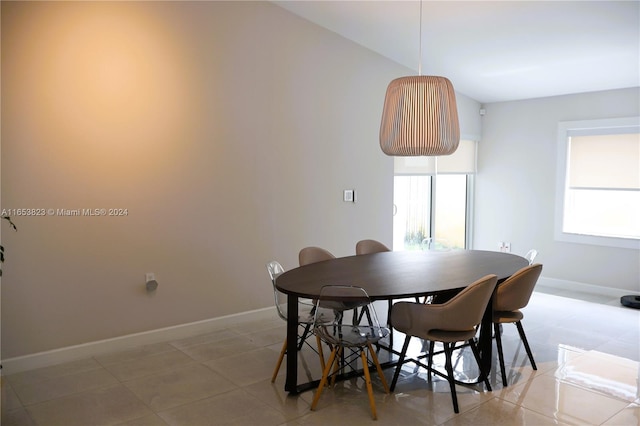 dining room featuring light tile patterned flooring