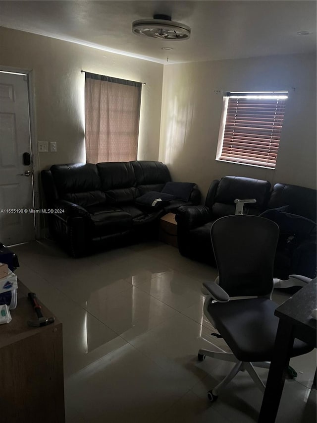 living room with tile patterned flooring