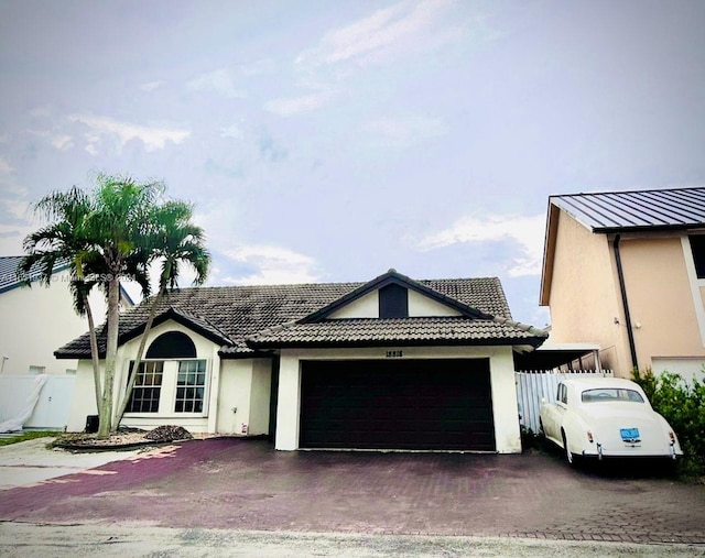 single story home with a garage