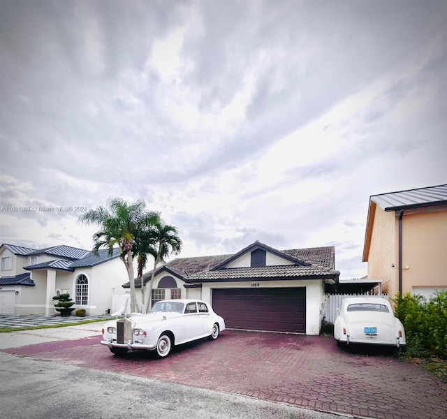 view of front of home with a garage