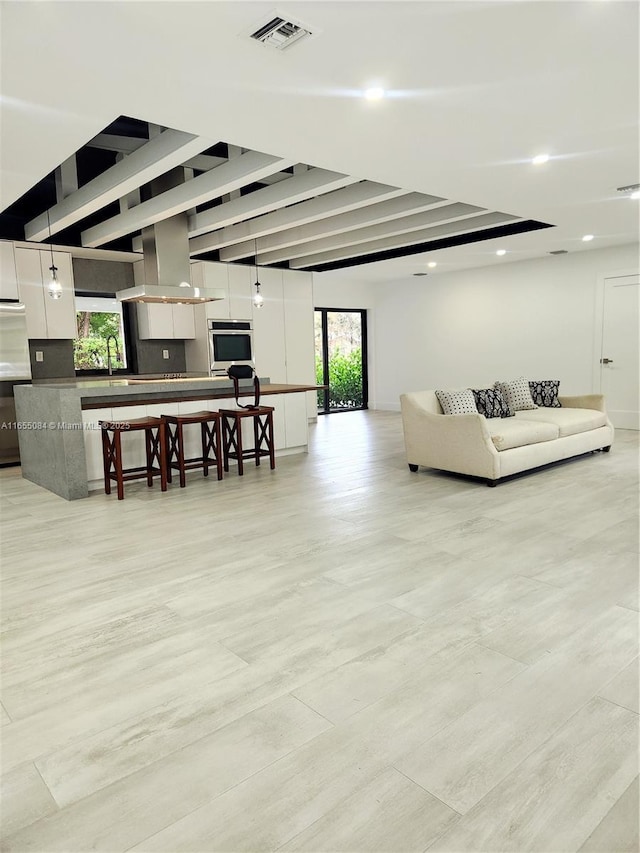 living room featuring sink