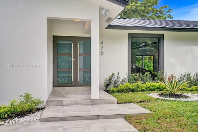 doorway to property featuring french doors