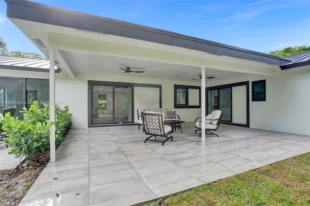 view of patio with ceiling fan