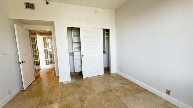 unfurnished bedroom featuring a closet