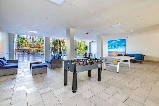 game room featuring expansive windows