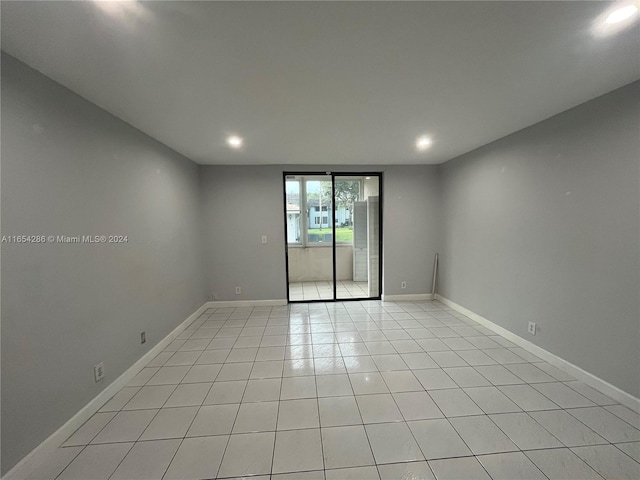 view of tiled spare room