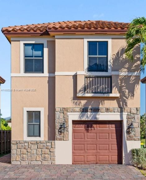 view of front of home featuring a garage