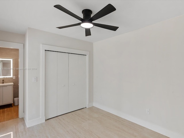 unfurnished bedroom featuring a closet, ceiling fan, and light hardwood / wood-style flooring