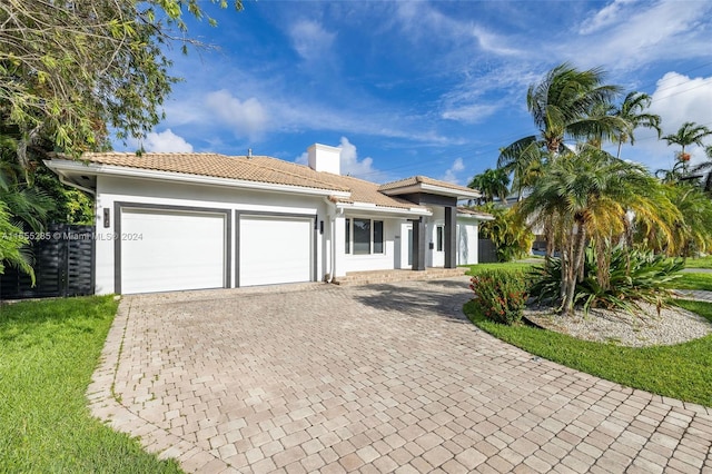 view of front of home featuring a garage