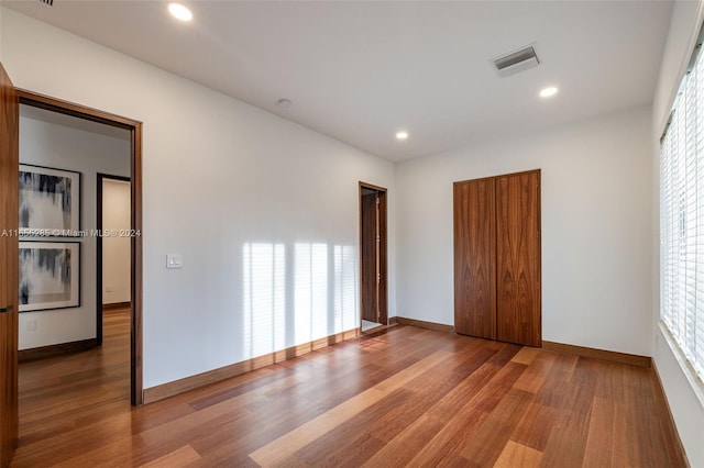 unfurnished bedroom featuring wood-type flooring