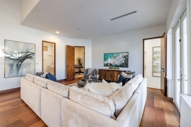 living room with wood-type flooring