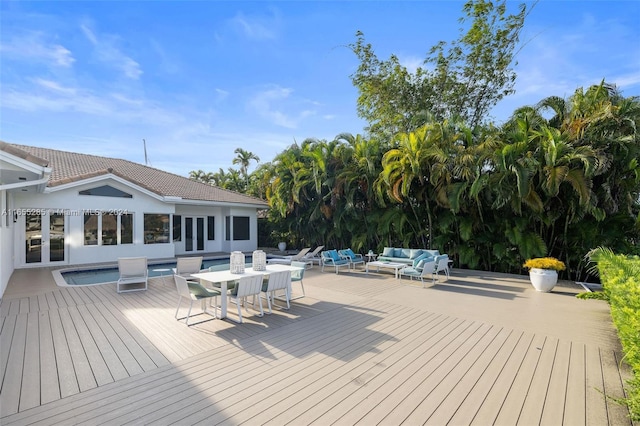 deck with an outdoor hangout area