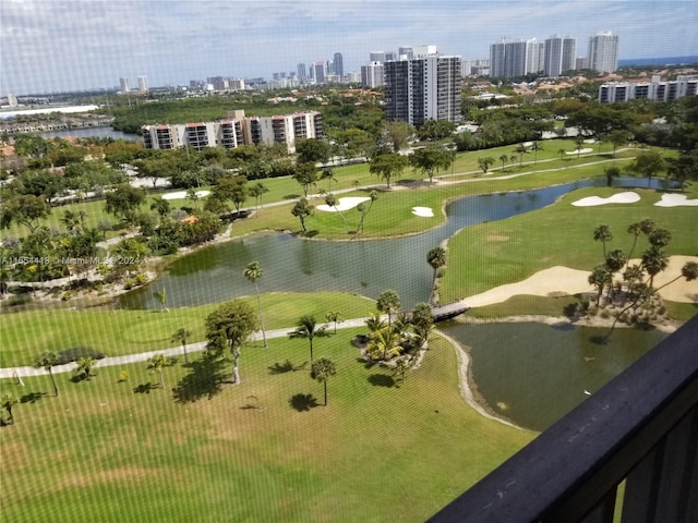 surrounding community featuring a water view