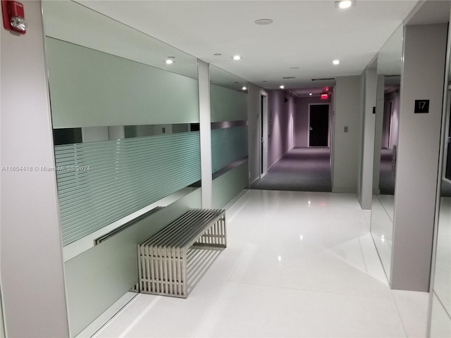 hallway featuring tile patterned floors