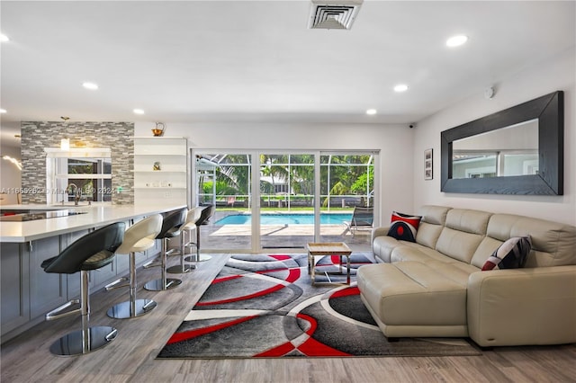 living room with light hardwood / wood-style floors