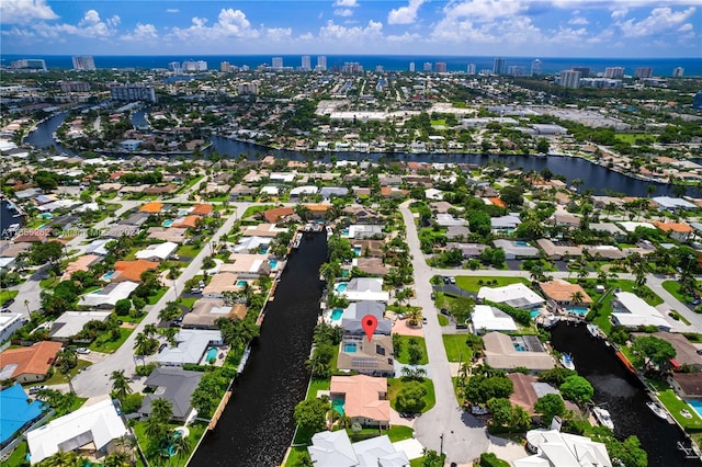 drone / aerial view featuring a water view