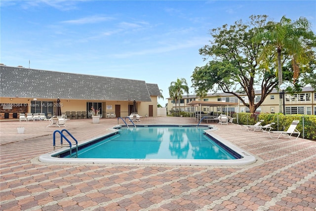 view of pool featuring a patio