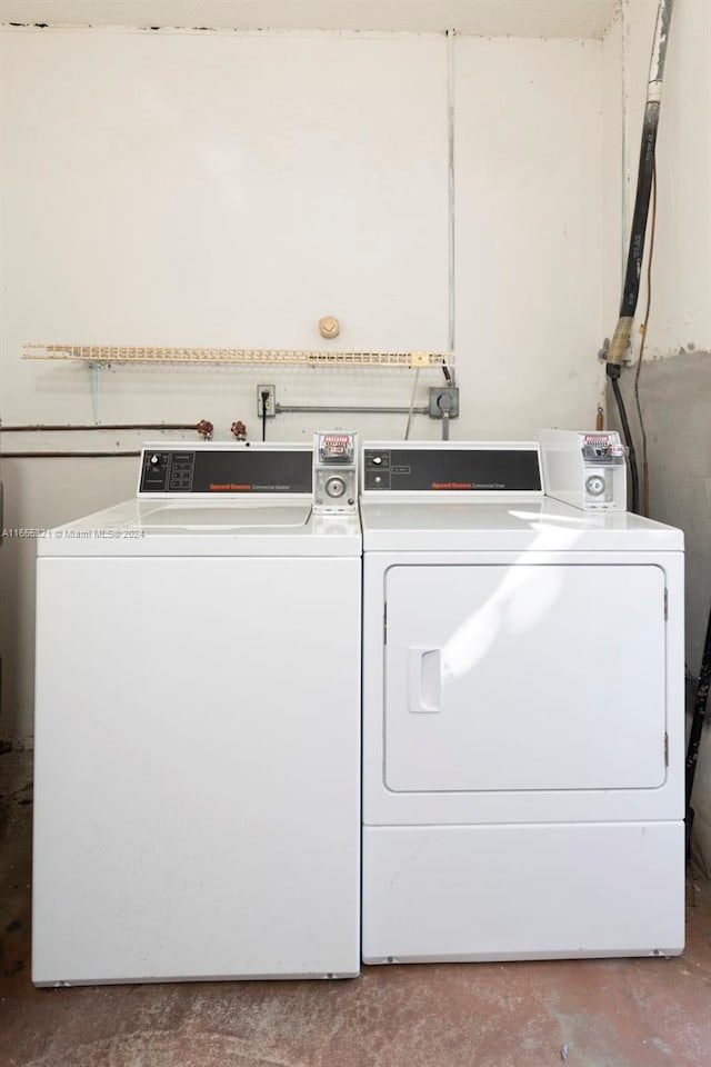 washroom with separate washer and dryer