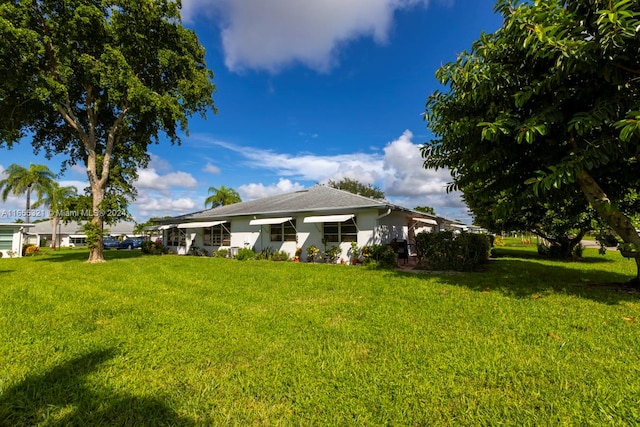 exterior space featuring a yard