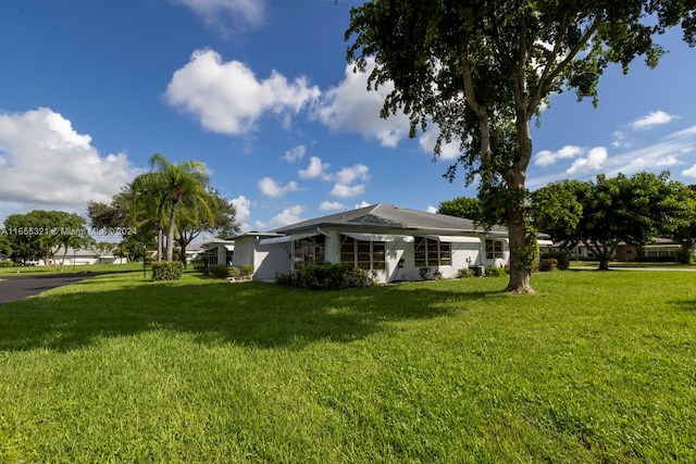 exterior space with a lawn