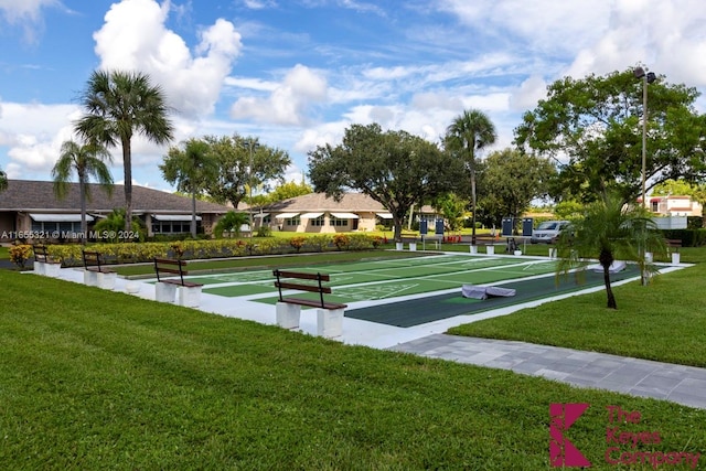 view of home's community with a lawn