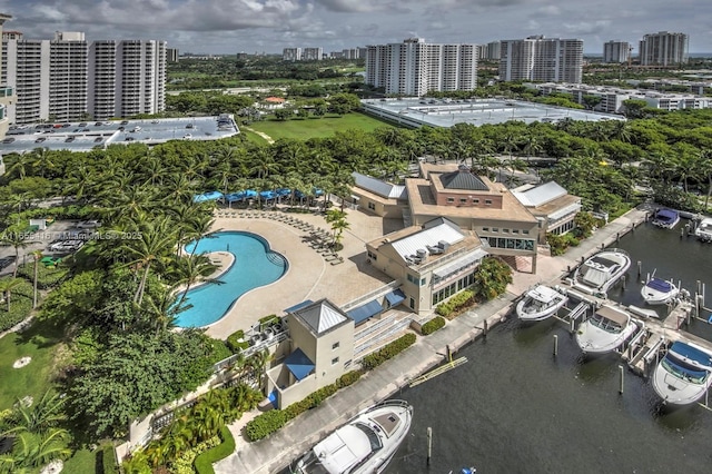 birds eye view of property with a water view