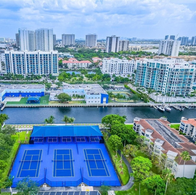 birds eye view of property with a water view