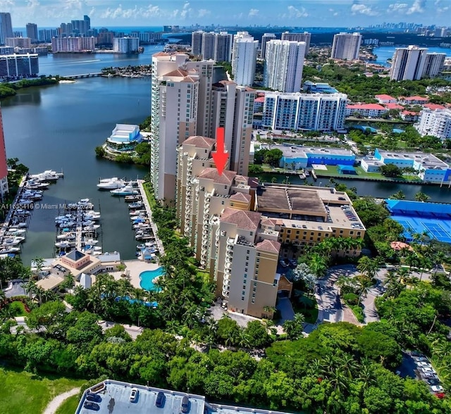 birds eye view of property featuring a water view