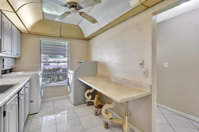kitchen featuring independent washer and dryer, a ceiling fan, light countertops, light tile patterned flooring, and lofted ceiling