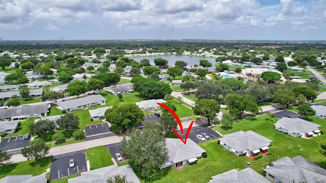 aerial view featuring a residential view and a water view