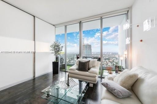 living room featuring hardwood / wood-style floors and expansive windows