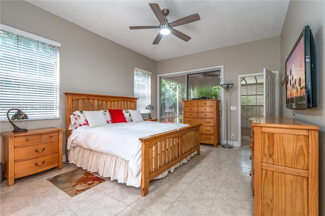 tiled bedroom with ceiling fan