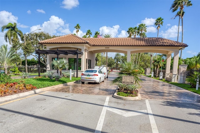 view of vehicle parking featuring a carport