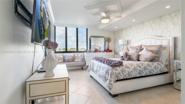 tiled bedroom featuring ceiling fan