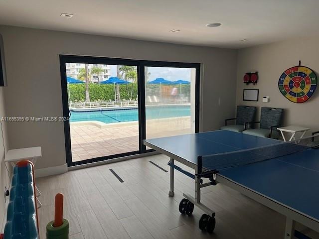 game room featuring hardwood / wood-style floors