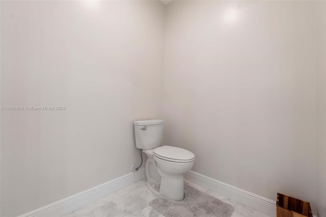 bathroom featuring toilet