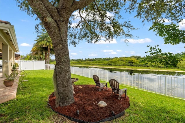 view of yard with a water view