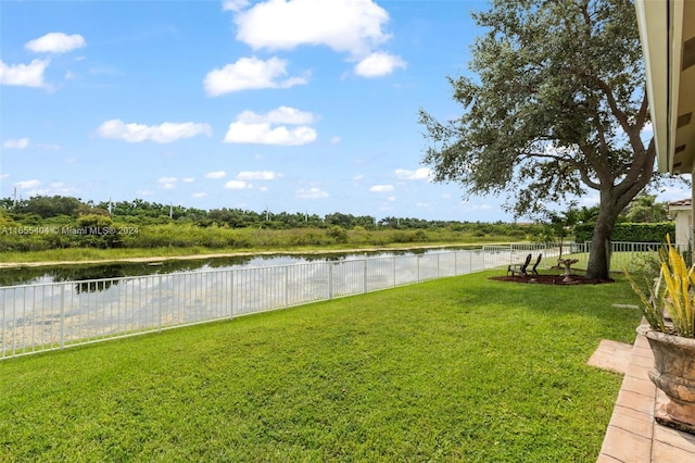 view of yard with a water view