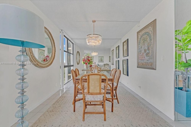 tiled dining area with a notable chandelier