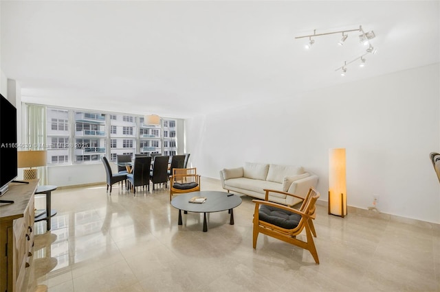 living area with light tile patterned floors