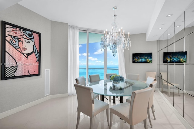 dining room with a chandelier and plenty of natural light