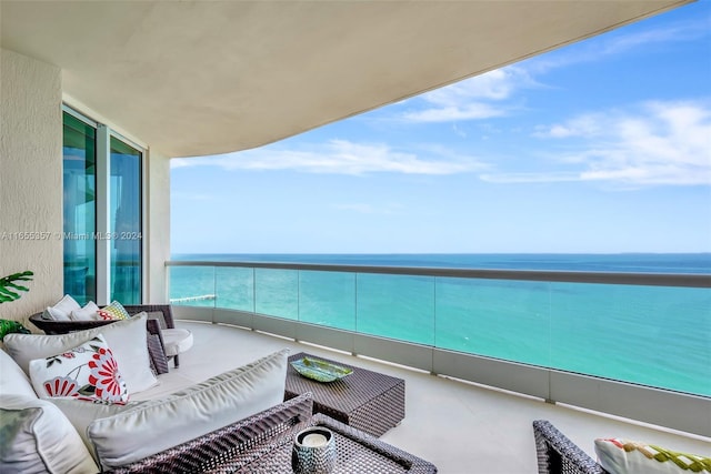 balcony featuring a water view